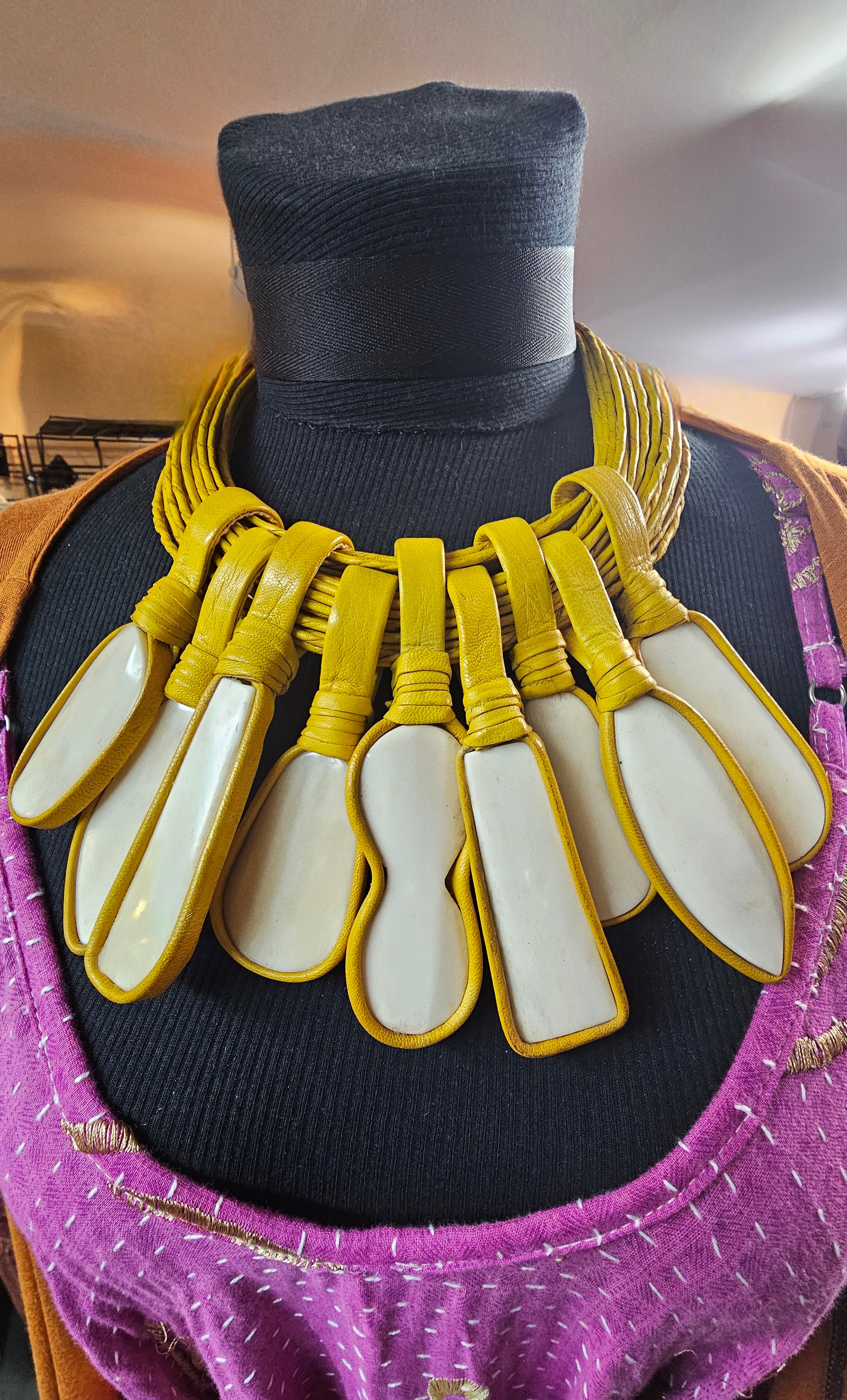 Ethnic leather necklace with fossil