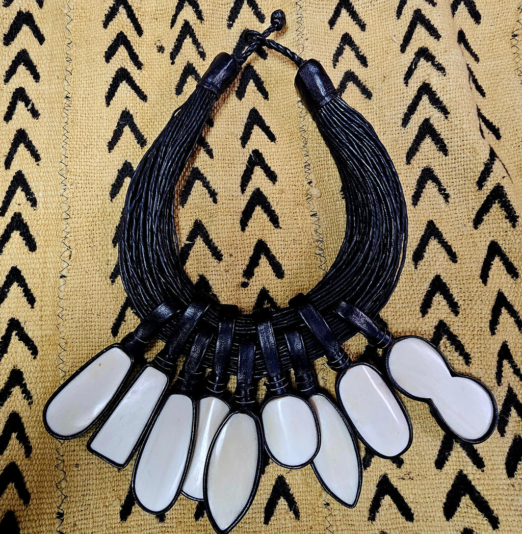 Ethnic leather necklace with fossil